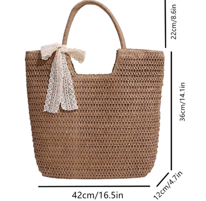 1129 Straw bag decorated with a butterfly knot